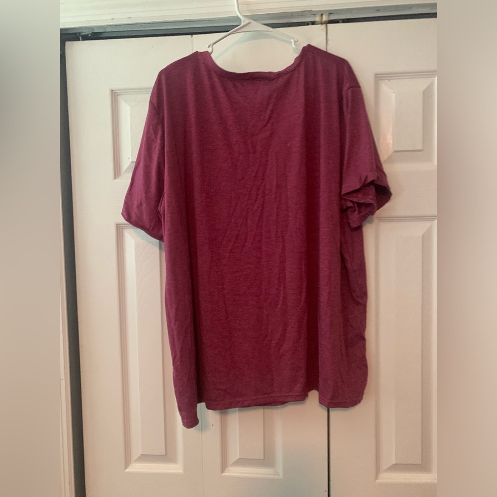 Size is 5xl fits more like a 4xl brand new purple color comes in bag